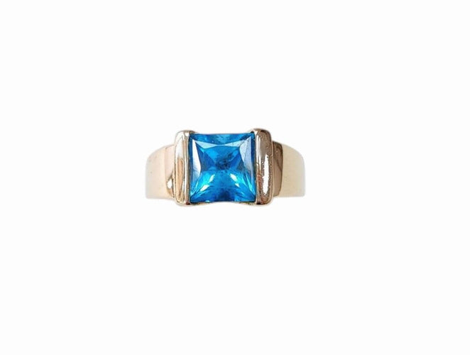 Bague or jaune topaze bleue