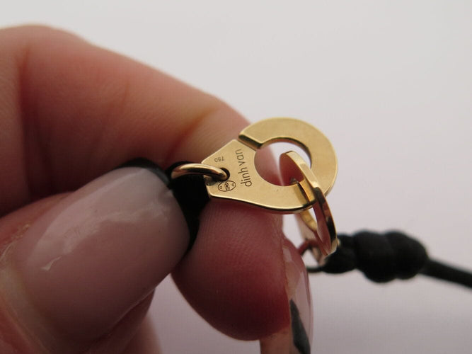 Bracelet bracelet DINH VAN menottes r10 341102 en or jaune 18k 2.9gr & cordon noir 58 Facettes 270151