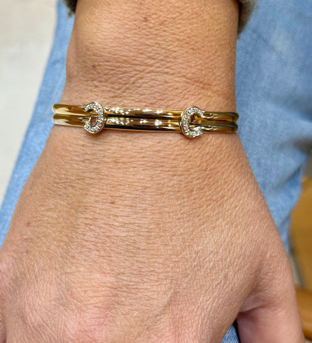 Bracelet Bracelet Cartier vintage double C en or et diamants 58 Facettes