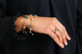 Bracelet Lot de quatre bracelets en or jaune et perles 58 Facettes