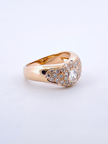 Bague 56 Bague ondulée en or jaune, diamants 58 Facettes