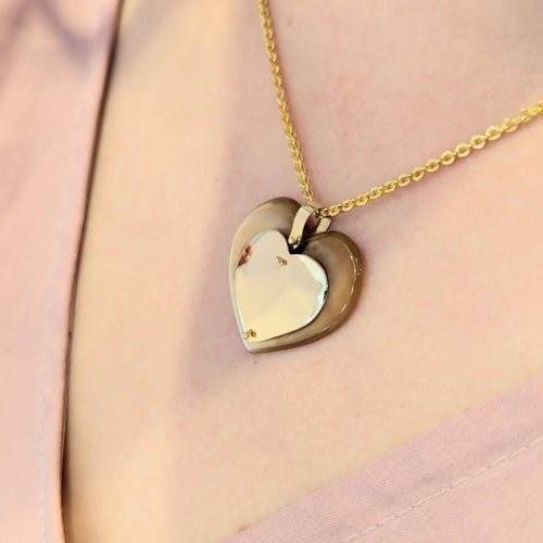 Pendentif Pendentif cœur en or jaune et nacre 58 Facettes 30069