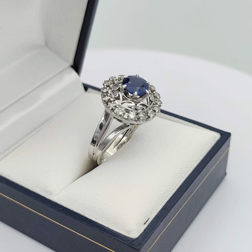 Bague 50 Bague or gris et platine, saphir, diamants 58 Facettes