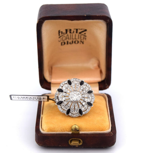Bague Bague en or blanc ornée d'un travail ajouré spécial 58 Facettes AN470