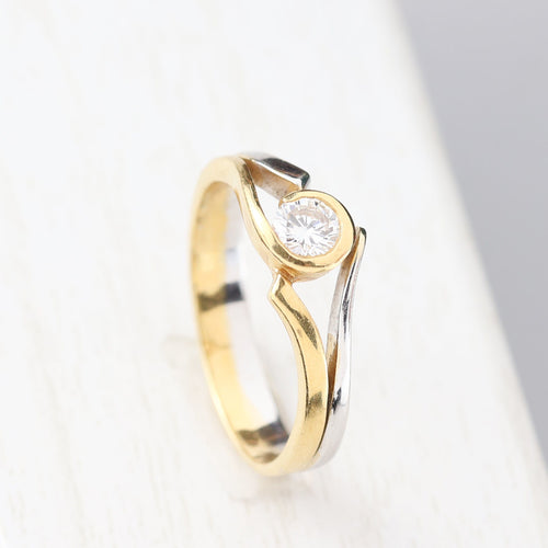 Bague Bague solitaire bicolore avec diamant taille brillant 58 Facettes 129595