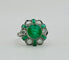 Bague Bague vintage en platine ornée d'émeraudes et de diamants 58 Facettes 50265