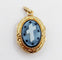 Pendentif Pendentif porte photo souvenir antique or jaune 18k plaques noires, croix et étoiles (circa 1900) 58 Facettes A06198