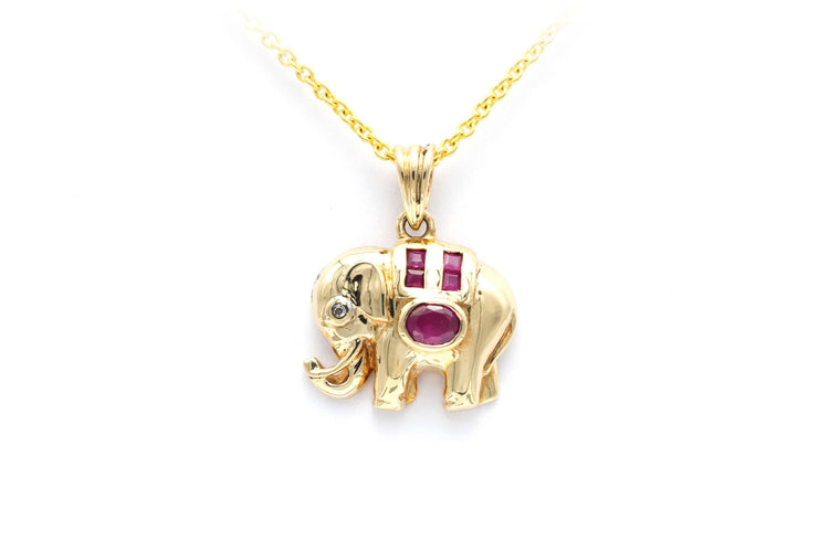 Pendentif Pendentif en or jaune serti de rubis et d'un diamant 58 Facettes B554