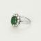 Bague 50 Bague marguerite en or blanc, émeraude et diamants 58 Facettes B250523