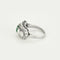 Bague 53 Bague en or blanc, diamants et émeraude 58 Facettes B240734