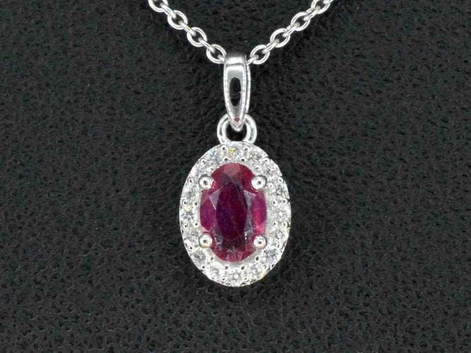 Pendentif Pendentif en or blanc serti de diamants et de rubis 58 Facettes 2017
