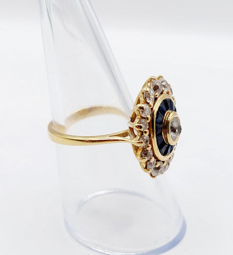 Bague 54 Bague marguerite art déco or jaune, diamants et saphir calibrés 58 Facettes A05533