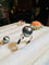 Bague 56 Bague en or sertie d'une perle de culture grise entourée de 2 diamants 58 Facettes 2920 A