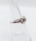 Bague 53 Bague art deco or blanc 18k ornée d'un diamant rond dans une monture géométrique finement travaillée (circa 1930) 58 Facettes A04979