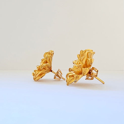 Boucles d'oreilles Boucles d’oreilles motif floral en or jaune 58 Facettes GEL-ER-FLW-YG
