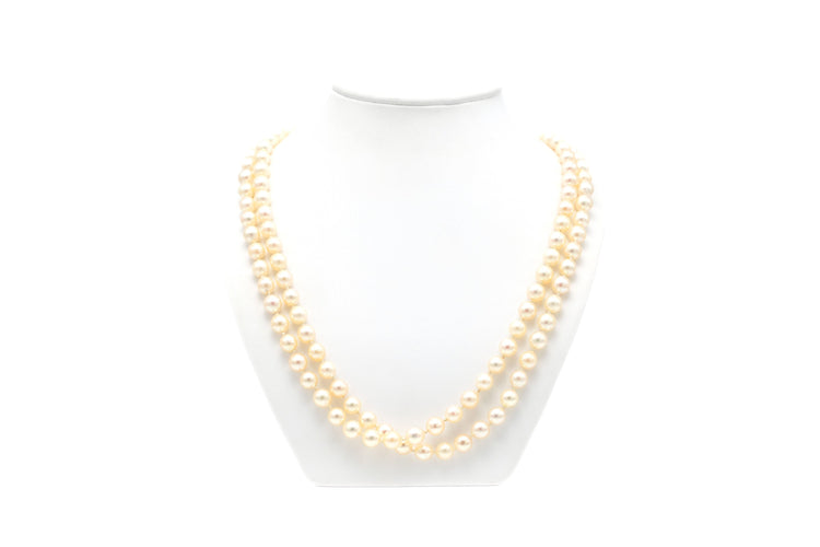 Collier Collier Années 70 en or blanc 18 carats, émeraude et perles 58 Facettes B677
