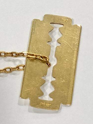 Pendentif Pendentif DINH VAN lame de rasoir or jaune 58 Facettes