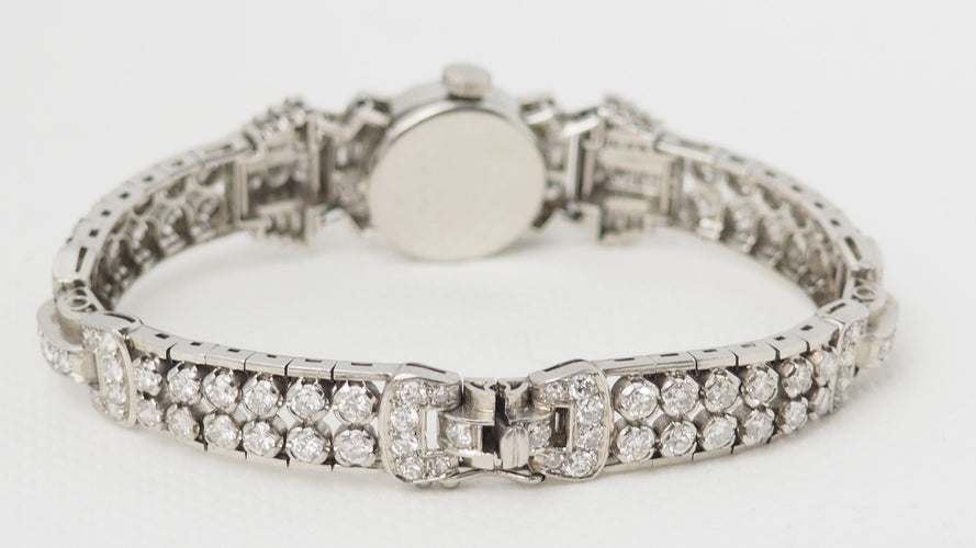 Montre 16cm Montre Ery en or platine et diamants 58 Facettes 32306
