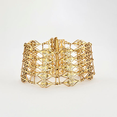 Bracelet Bracelet manchette à décor ajouré or jaune 58 Facettes