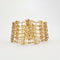 Bracelet Bracelet manchette à décor ajouré or jaune 58 Facettes