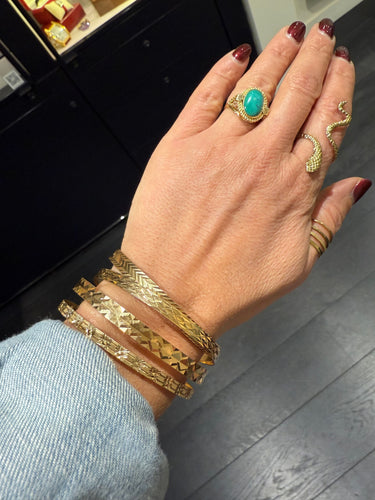 Bracelet 4 Bracelets joncs ciselés en or jaune 58 Facettes 1.0001394/2