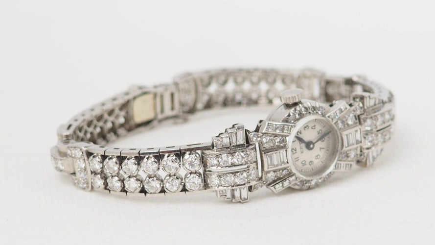 Montre 16cm Montre Ery en or platine et diamants 58 Facettes 32306