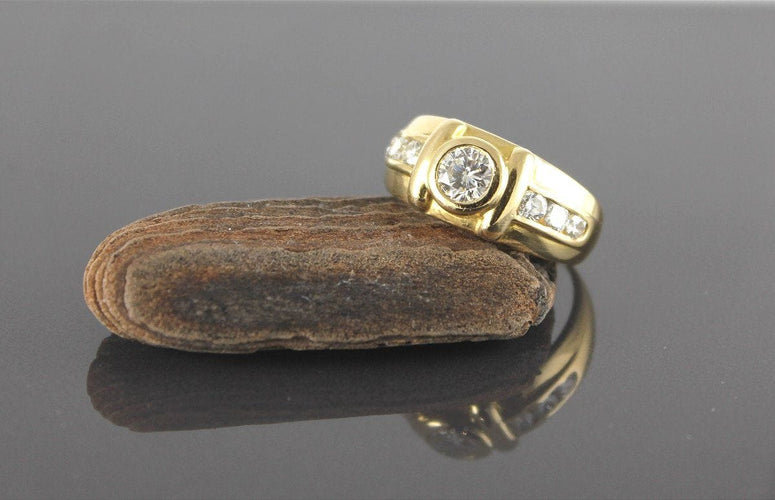 Bague 56 Bague Mixe Or jaune et Diamants (centre +/-0.55 Ct + 0.40 Ct Entourage) 58 Facettes