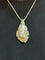 Collier Collier or , diamants , mabe de Tahiti et émeraudes 58 Facettes