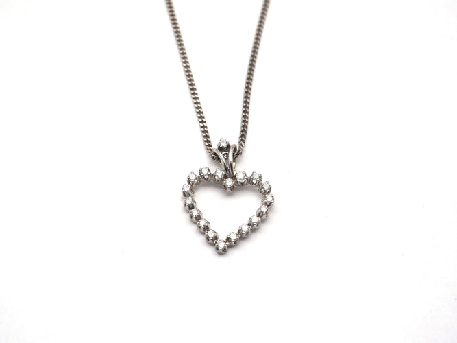 Collier Collier en or blanc 750 mil et pendentif cœur en diamants 58 Facettes