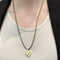 Pendentif Pendentif Poiray, "Coeur Entrelacé", or jaune. 58 Facettes 35321