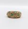 Bague 50 Bague dôme bombée pavée en or 18k et diamants, émeraudes 58 Facettes A06602