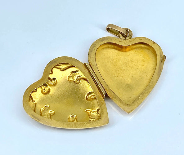Pendentif Pendentif coeur ouvrant en or jaune 18 carats 58 Facettes AB452