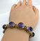Bracelet Bracelet en or 18 carats sertie de 9 améthystes en cabochon 58 Facettes AB88