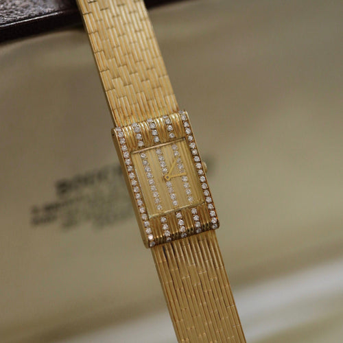 Montre Montre Boucheron Reflet – Or Jaune 18k – 1.0 ct Diamants – Vers 1990 – Bracelet Or Massif 19 cm 58 Facettes FB10910