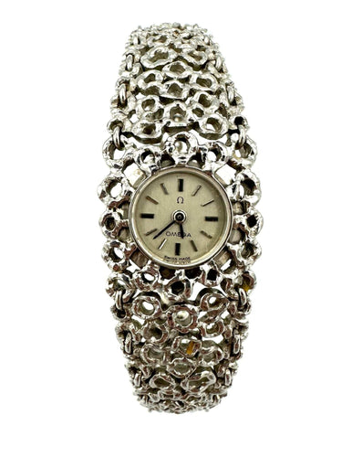 Montre GILBERT ALBERT/OMEGA - Montre de dame vintage en or blanc 58 Facettes