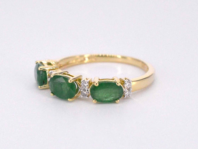 Bague Bague en or avec diamants et émeraude 58 Facettes 2127