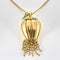 Pendentif RENE BOIVIN - Pendentif "Coloquinte" en or jaune diamants et émeraudes 58 Facettes