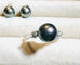 Bague 56 Bague en or sertie d'une perle de culture grise entourée de 2 diamants 58 Facettes 2920 A