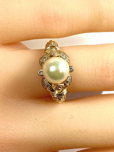 Bague 52 Bague en or jaune 18 carats, perle et 38 diamants 58 Facettes AB448