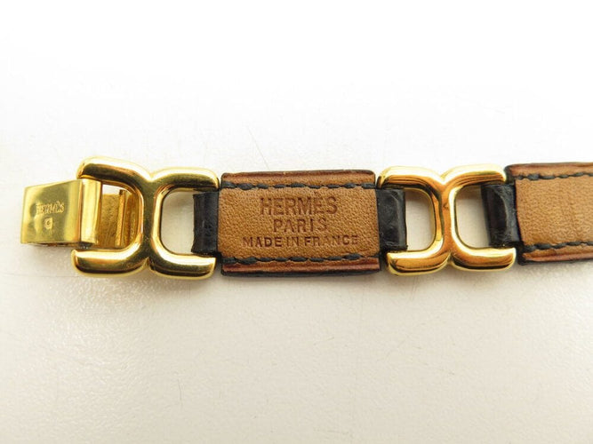 Bracelet vintage bracelet HERMES place beauvau 17cm cuir crocodile alligator noir 58 Facettes 265969
