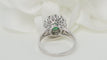 Bague 55 Bague entourage en or blanc, émeraude ovale et diamants 58 Facettes 32326