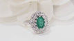 Bague 51 Bague marguerite en or blanc, émeraude et diamants 58 Facettes F4947