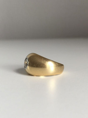 Bague bombée en or jaune 18K et diamant