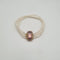 Bracelet Bracelet or rose 18 carats serti de perles fines et pierre rose 58 Facettes