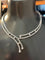 Collier Collier double ligne en or blanc et diamants 58 Facettes 258993