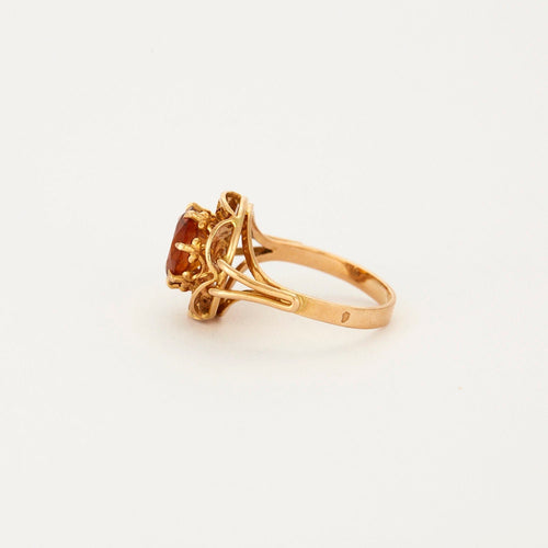 Bague Bague en or jaune et pierre de synthèse orange 58 Facettes 240179