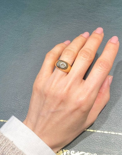 Bague bombée en or jaune 18K et diamant