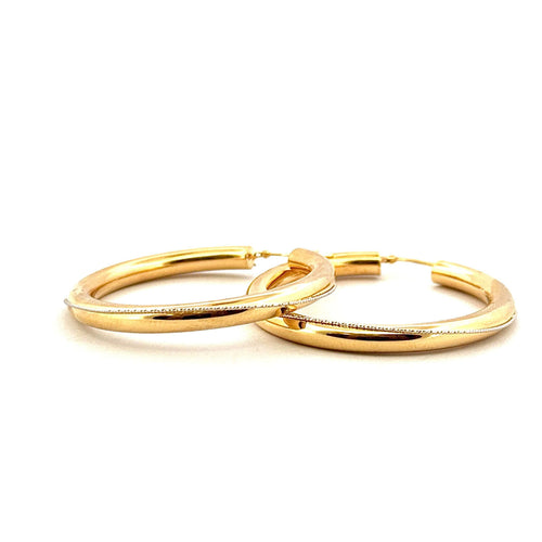 Boucles d'oreilles Créoles en or jaune et blanc 58 Facettes