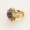 Bague 55,5 Importante bague en or jaune, or blanc, diamants et saphir de synthèse 58 Facettes BIA1089X2