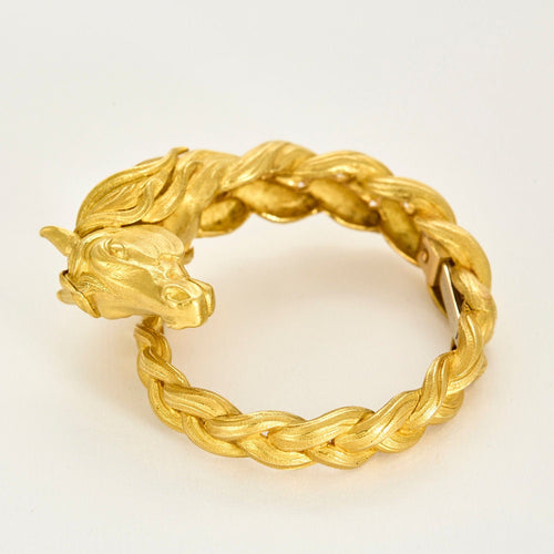 HERMES - Bracelet jonc en or jaune a motif de cheval